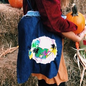 Up cycled bag with hand sown detailing